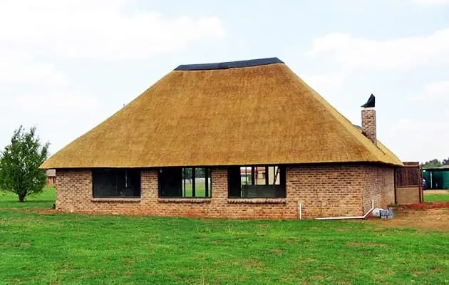 Brick Home with Thatch — thatch roofing project by Thatch Roof Solutions